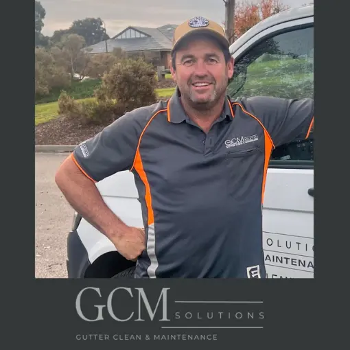 Stewart from GCM Solutions standing beside a service vehicle, providing professional gutter cleaning and maintenance services in Melbourne.